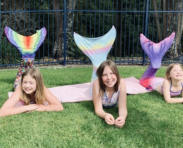 three Mermaids at a Merventure Mermaid class