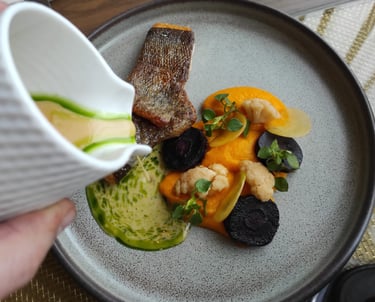 grilled fish with carrot puree and split butter sauce