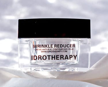 Idrotherapy cream for skin rejuvenation in a modern skincare setting