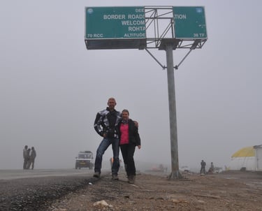 Tracey Billington riding the Leh to Manali highway over the great Himalayan range, Ladakh, India 