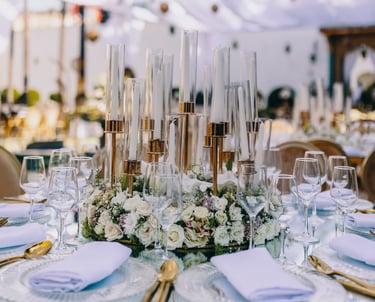 table decorated with flowers and candles