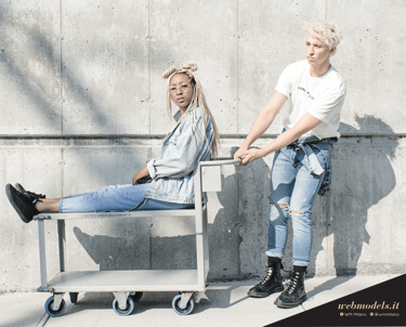 a person holding a business card with a business card