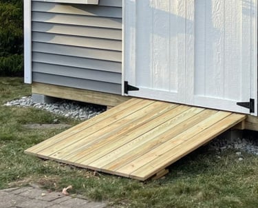 Standard pressure treated shed ramp built in Rhode Island for easy entry and accessibility.