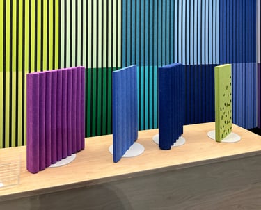 hues of green blue and purple slatted PET acoustic panels AKUSTUS
