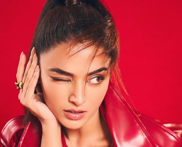 a woman in a red leather jacket