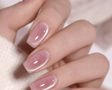 Pink resin stone press-on nails for a woodland fairy floral baby shower look