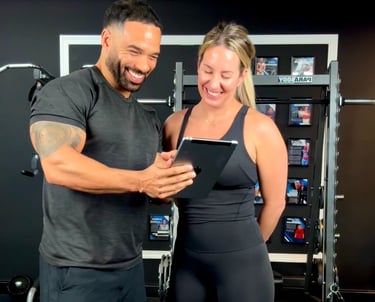 fitness trainer nutrition counseling with woman