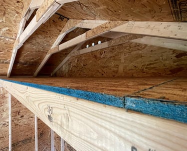 Custom shed with built-in loft for extra storage, handcrafted in Massachusetts and Rhode Island.