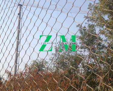 Durable stainless steel wire rope mesh used for zoo enclosure fencing and aviary netting.