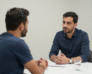 A warm, inviting photo of Bekir Köksal and his two assistants in a serene, softly lit consultation room.