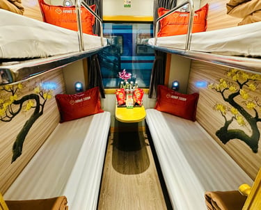 Hana Train Deluxe Cabin with four sleeper berths, modern interior, soft bedding, and spacious layout