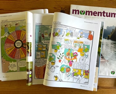 aufgeschlagene Zeitschriften mit Comics über soziale Themen 