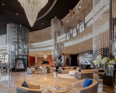 a large circular table with a glass chandelier