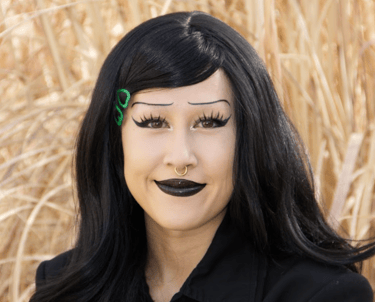 Headshot of Ferrin Jaudon in a black suit.