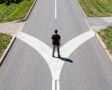 A warm, inviting workspace with a laptop open to a simple calculator interface and a cup of coffee nearby.