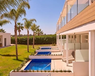 Palm Trees and Private Swimming Pools at Zafiro Alzinar Mar