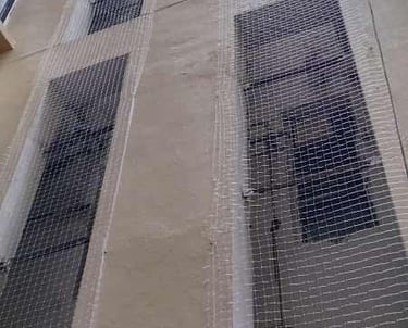 Close-up of strong, weather-resistant anti-pigeon net material.