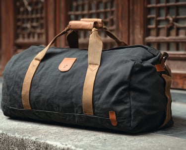 Duffel bag with shoe pocket and mesh panel