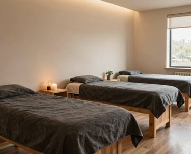 A tranquil photography shot of a wellness center in the North American / US, featuring clean lines, natural wood elements, and a calm beige and dark slate color scheme. The lighting is warm and welcoming, reflecting health and social well-being.