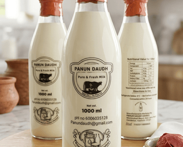 glass bottles of Panun Daudh pure and fresh milk