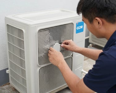 Technician carefully inspecting an air duct with a camera in a modern home.