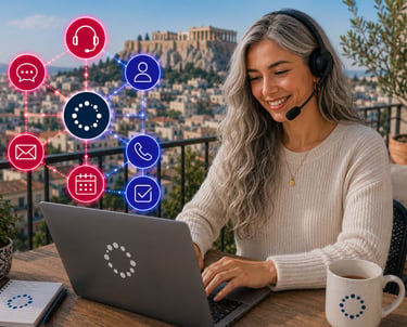 A smiling remote worker with a headset using a laptop in Athens, featuring omnichannel support icons.