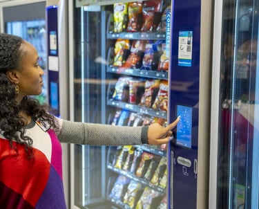 Person using snack machine