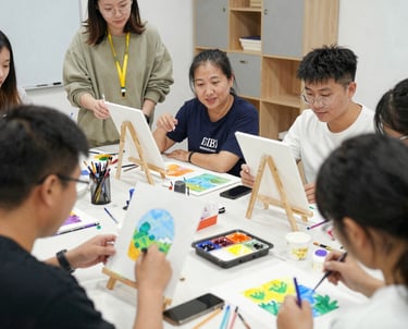 A vibrant workshop scene with young people collaborating around circular tables, creating art with mixed media under soft natural light.