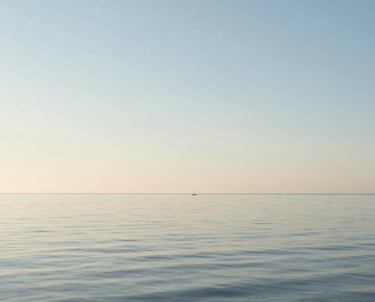 A serene coastal landscape in Denmark with calm water and a clear horizon, reflecting a sense of peace and progress. Soft morning light in off-white and steel blue tones.