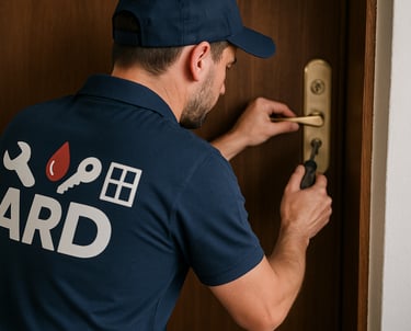 a man in a blue shirt is holding a key to a door