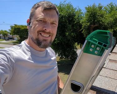 Dryer vent cleaner on a ladder, Roof Vent Cleaning, Duct Cleaning, Dryer Vent Repair