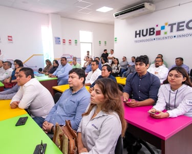 Professionals attend a corporate training session at Hub Tech for technology and innovation.