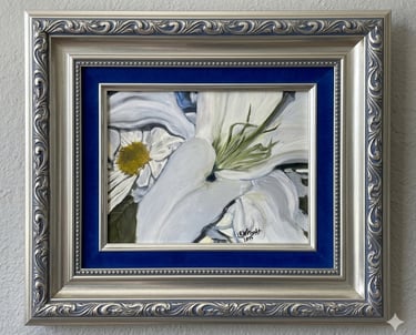 Framed oil painting of white lilies and a daisy in an ornate silver frame with blue velvet matting.