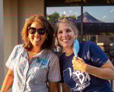 Two smiling women posing for the camera