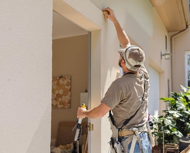 A man fixing house