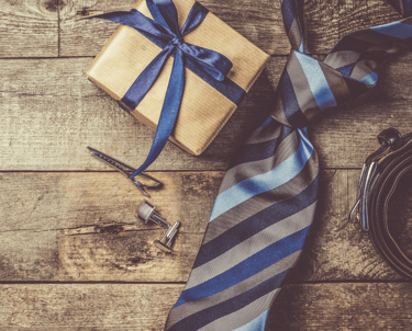 a gift box with a tie and a tie on it