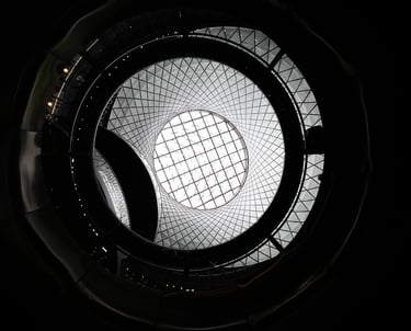 a circular glass window with a skylight