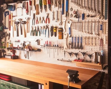 a workbench with tools and tools on it