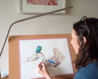 Artist painting ducks