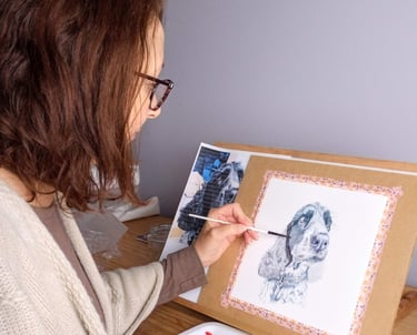 Artist painting a Pet Portrait in her studio