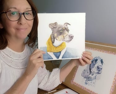 Artist showing pet portrait artworks