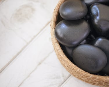 Full body hot stone massage for deep relaxation during Ballarat Winter Festival 2025 – warm winter t