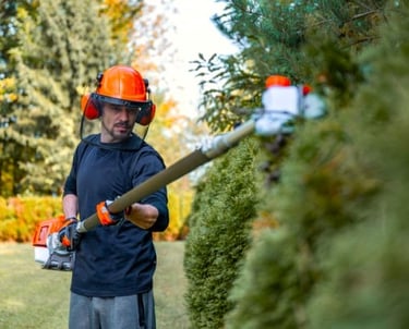 Landscape employee performing work