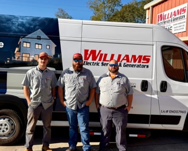 3 Williams Electric Service & Generators technicians standing in front of there service van.