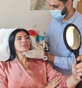 a woman in a mask mask and a man in a mask