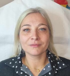 a woman in a hospital bed with a hospital bed