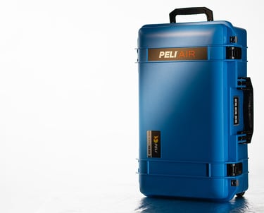 a blue suitcase peli air