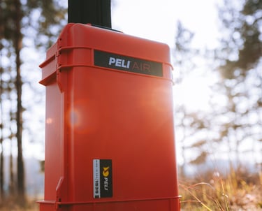 a orange pelican peli suitcase