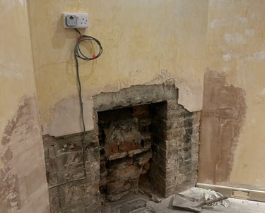 Fireplace out... waiting to become an entertainment centre!