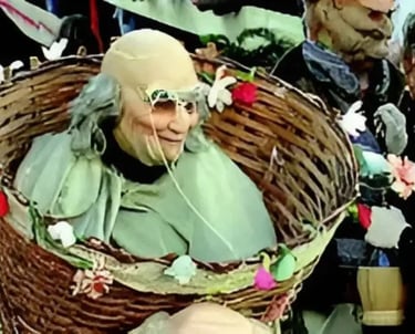 Masked “Maschér” clown in a wicker basket costume with flowers during Bagolino Carnival in Lombardy,